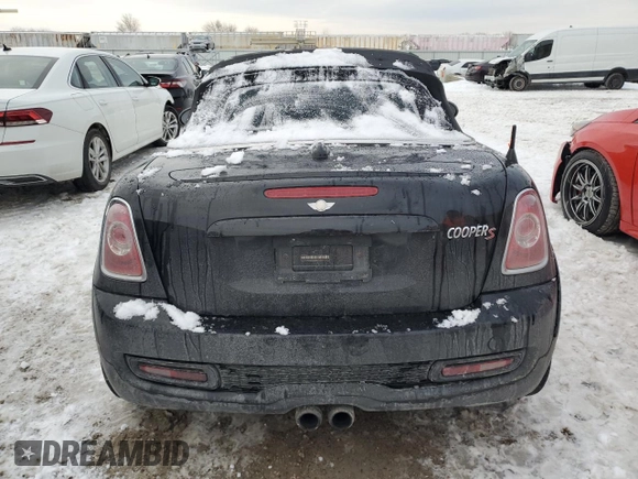 2013 MINI Roadster S z VIN WMWSY3C58DT566208, wystawiony jako Copart lot #41480595 z przebiegiem 119 265 mil mil oraz Szkody całkowita. Historia ofert i sprzedaży dostępna na DreamBid. Obrazek 6.