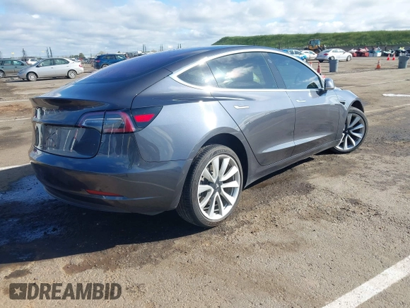 2018 Tesla Model 3 Long Range Battery with VIN 5YJ3E1EA4JF006036, listed as a IAAI auction lot 41934680 with 115,649 mi miles and . Bid and sale history available at DreamBid. Image 4.
