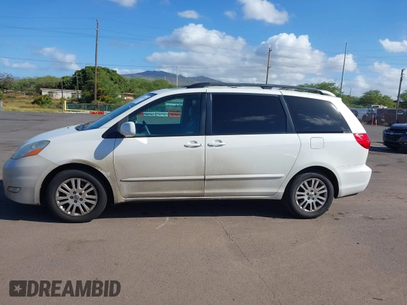 2010 Toyota Sienna XLE with VIN 5TDYK4CC3AS336590, listed as a IAAI auction lot 41798194 with 230,707 mi miles. Bid and sale history available at carsss.com. Image 14.