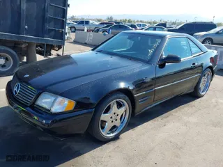 2002 Mercedes-Benz SL-Class with VIN WDBFA68F72F202884, listed as a IAAI auction lot 41473512 with 184,456 mi miles. Bid and sale history available at carsss.com. Image 6.