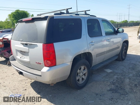 2013 GMC Yukon SLT with VIN 1GKS1CE09DR268602, listed as a IAAI auction lot 41992325 with 167,476 mi miles. Bid and sale history available at carsss.com. Image 4.