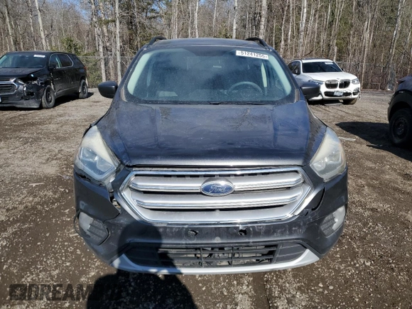 2017 Ford Escape SE with VIN 1FMCU0GD3HUD61572, listed as a Copart auction lot 51241255 with 215,193 mi miles and Clean Title. Bid and sale history available at carsss.com. Image 5.