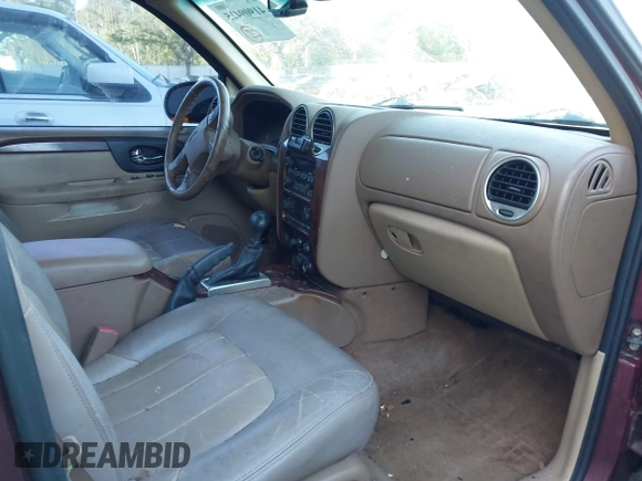 2003 GMC Envoy SLT with VIN 1GKDS13S132118361, listed as a IAAI auction lot 41909425 with 283,342 mi miles. Bid and sale history available at carsss.com. Image 5.