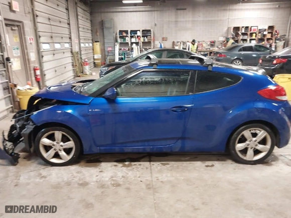 2014 Hyundai Veloster with VIN KMHTC6AD4EU196870, listed as a IAAI auction lot 41207663 with 119,252 mi miles. Bid and sale history available at carsss.com. Image 14.