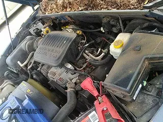 2005 Dodge Dakota SLT with VIN 1D7HW48K15S163935, listed as a IAAI auction lot 43167895 with 149,958 mi miles and . Bid and sale history available at DreamBid. Image 12.