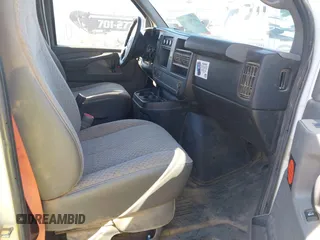 2014 Chevrolet Express Cargo Van with VIN 1GCWGFCAXE1205405, listed as a IAAI auction lot 41700218 with 397,332 mi miles. Bid and sale history available at carsss.com. Image 5.