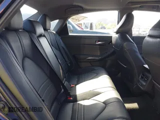 2021 Toyota Avalon Hybrid XSE z VIN 4T1EA1AB3MU005275, wystawiony jako IAAI lot #42335546 z przebiegiem 46 524 mil mil oraz . Historia ofert i sprzedaży dostępna na DreamBid. Obrazek 8.