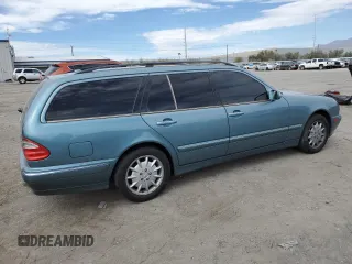 2001 Mercedes-Benz E-Class with VIN WDBJH65J01B292156, listed as a Copart auction lot 49556935 with 179,223 mi miles and Salvage Title. Bid and sale history available at carsss.com. Image 3.