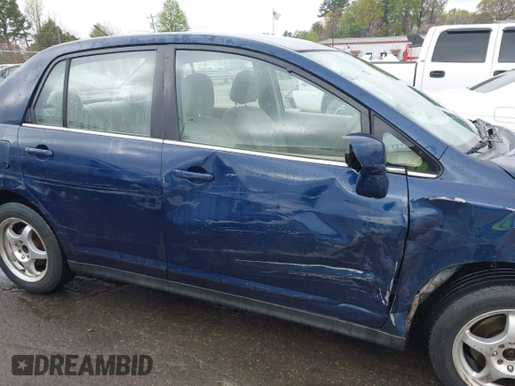 2007 Nissan Versa 1.8 SL with VIN 3N1BC11E67L420474, listed as a IAAI auction lot 41887735 with 199,094 mi miles. Bid and sale history available at carsss.com. Image 17.