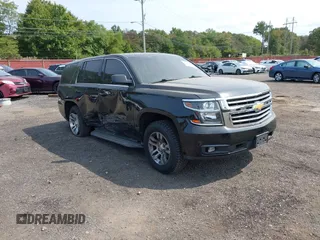 2020 Chevrolet Tahoe Commercial z VIN 1GNSKDKC2LR256021, wystawiony jako IAAI lot #40351521 z przebiegiem 61 531 mil mil oraz . Historia ofert i sprzedaży dostępna na DreamBid. Obrazek 1.