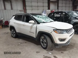 2020 Jeep Compass Limited with VIN 3C4NJDCB3LT120048, listed as a IAAI auction lot 41366651 with 83,260 mi miles. Bid and sale history available at carsss.com. Image 1.