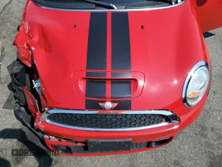 2013 MINI Roadster S z VIN WMWSY3C58DT594039, wystawiony jako Copart lot #65833804 z przebiegiem Nie podano mil oraz Szkody całkowita. Historia ofert i sprzedaży dostępna na DreamBid. Obrazek 11.