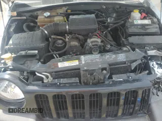 2003 Jeep Liberty Sport z VIN 1J4GK48K43W657028, wystawiony jako Copart lot #55070315 z przebiegiem 243 019 mil mil oraz Szkody całkowita. Historia ofert i sprzedaży dostępna na DreamBid. Obrazek 12.