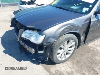 2016 Chrysler 300 Anniversary Edition with VIN 2C3CCARG7GH230414, listed as a IAAI auction lot 41853857 with 84,639 mi miles and . Bid and sale history available at DreamBid. Image 6.