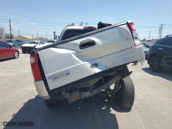 2004 Ford Explorer Sport Trac XLS with VIN 1FMZU67K34UB93390, listed as a Copart auction lot 53912075 with 220,520 mi miles and Salvage Title. Bid and sale history available at carsss.com. Image 6.