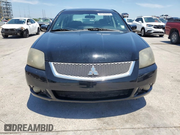2010 Mitsubishi Galant ES z VIN 4A32B3FF4AE007728, wystawiony jako Copart lot #55102034 z przebiegiem 208 463 mil mil oraz Szkoda całkowita • Salvage title. Historia ofert i sprzedaży dostępna na DreamBid. Obrazek 5.