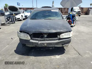 2000 Nissan Altima GXE with VIN 1N4DL01A0YC151534, listed as a Copart auction lot 87019454 with 233,012 mi miles and Clean Title. Bid and sale history available at carsss.com. Image 5.