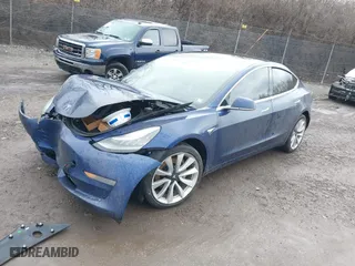 2019 Tesla Model 3 Mid Range with VIN 5YJ3E1EA6KF332812, listed as a IAAI auction lot 41586157 with 80,230 mi miles. Bid and sale history available at carsss.com. Image 17.