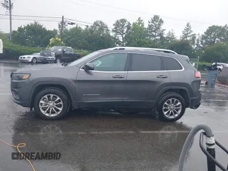 2019 Jeep Cherokee Latitude Plus with VIN 1C4PJMLB7KD195591, listed as a IAAI auction lot 42433607 with 58,370 mi miles and . Bid and sale history available at DreamBid. Image 14.