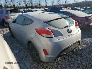 2015 Hyundai Veloster z VIN KMHTC6AD9FU236037, wystawiony jako Copart lot #43710405 z przebiegiem 130 254 mil mil oraz Czysty tytuł • Clean title. Historia ofert i sprzedaży dostępna na DreamBid. Obrazek 2.