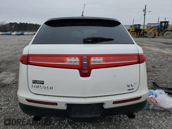 2014 Lincoln MKT EcoBoost with VIN 2LMHJ5ATXEBL50487, listed as a Copart auction lot 46649885 with 187,261 mi miles and Salvage Title. Bid and sale history available at DreamBid. Image 6.