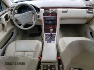 1999 Mercedes-Benz E-Class with VIN WDBJF82H2XX015586, listed as a Copart auction lot 44465455 with 76,890 mi miles and Salvage Title. Bid and sale history available at carsss.com. Image 8.