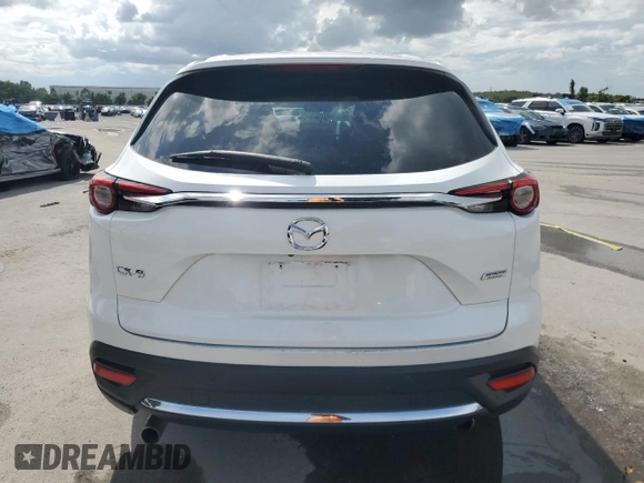 2021 Mazda CX-9 Grand Touring with VIN JM3TCADY7M0501717, listed as a Copart auction lot 59402875 with 53,218 mi miles and Salvage title. Bid and sale history available at DreamBid. Image 6.