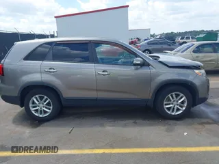 2015 Kia Sorento LX with VIN 5XYKT3A64FG611172, listed as a IAAI auction lot 42007348 with 120,426 mi miles. Bid and sale history available at carsss.com. Image 13.