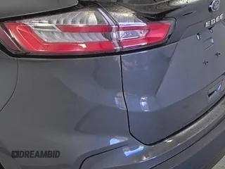 2022 Ford Edge SE z VIN 2FMPK4G97NBA56541, wystawiony jako IAAI lot #42122211 z przebiegiem 57 756 mil mil oraz . Historia ofert i sprzedaży dostępna na DreamBid. Obrazek 1.