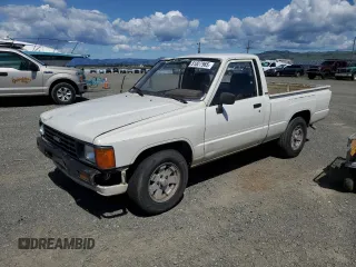1985 Toyota Pickup z VIN JT4RN50R4F0068265, wystawiony jako Copart lot #51827965 z przebiegiem 348 047 mil mil oraz Szkoda całkowita • Salvage title. Historia ofert i sprzedaży dostępna na DreamBid. Obrazek 1.