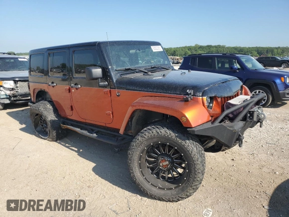 2012 Jeep Wrangler Unlimited Sport with VIN 1C4BJWDG0CL200802, listed as a Copart auction lot 63822365 with 116,501 mi miles and Salvage title. Bid and sale history available at DreamBid. Image 4.