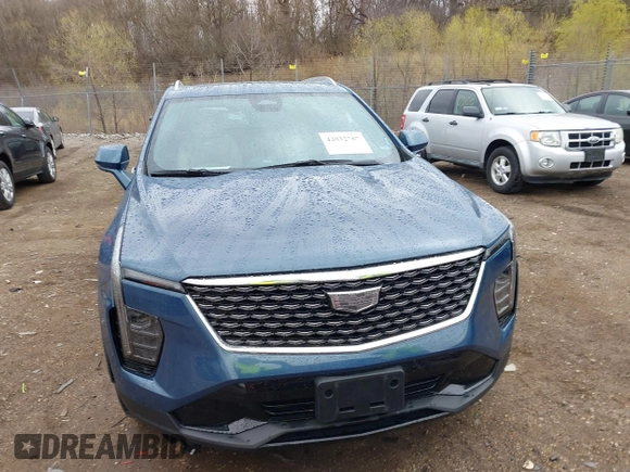 2024 Cadillac XT4 AWD Premium Luxury with VIN 1GYFZDR45RF143981, listed as a IAAI auction lot 42032787 with 14,700 mi miles and . Bid and sale history available at DreamBid. Image 12.