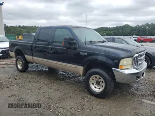 1999 Ford Super Duty F-250 XL with VIN 1FTNW21S8XED03752, listed as a Copart auction lot 70367694 with 350,640 mi miles and Salvage Title. Bid and sale history available at carsss.com. Image 4.