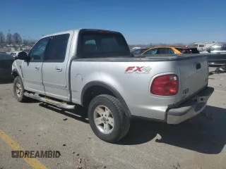 2003 Ford F-150 XLT with VIN 1FTRW08L03KD74119, listed as a Copart auction lot 47373105 with 303,513 mi miles and Salvage Title. Bid and sale history available at carsss.com. Image 2.