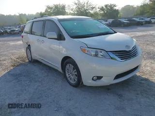 2015 Toyota Sienna XLE with VIN 5TDYK3DC5FS534913, listed as a IAAI auction lot 42052427 with 105,046 mi miles. Bid and sale history available at carsss.com. Image 1.