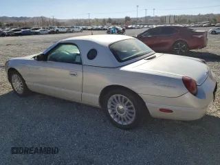 2005 Ford Thunderbird 50th Anniversary with VIN 1FAHP69A85Y106689, listed as a Copart auction lot 41338295 with 104,128 mi miles and Clean Title. Bid and sale history available at DreamBid. Image 2.