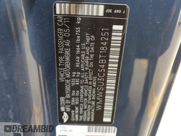 2011 MINI Hardtop with VIN WMWSU3C54BT184251, listed as a Copart auction lot 59298135 with 123,864 mi miles and Salvage title. Bid and sale history available at DreamBid. Image 12.