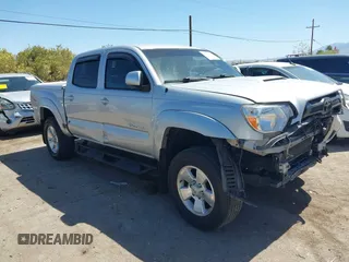 2013 Toyota Tacoma PreRunner z VIN 5TFJU4GN4DX035140, wystawiony jako IAAI lot #42283619 z przebiegiem 135 067 mil mil oraz . Historia ofert i sprzedaży dostępna na DreamBid. Obrazek 1.