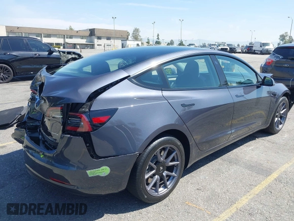 2023 Tesla Model 3 Long Range with VIN 5YJ3E1EB4PF635328, listed as a IAAI auction lot 41978099 with 32,747 mi miles and . Bid and sale history available at DreamBid. Image 4.