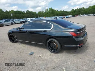 2020 BMW 7 Series 740i z VIN WBA7T2C06LGL17660, wystawiony jako Copart lot #57347885 z przebiegiem Nie podano mil oraz Tytuł czysty. Historia ofert i sprzedaży dostępna na DreamBid. Obrazek 2.