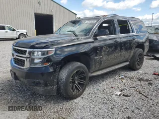 2015 Chevrolet Tahoe LT with VIN 1GNSKBKC3FR282880, listed as a Copart auction lot 57910235 with 234,559 mi miles and Salvage title. Bid and sale history available at DreamBid. Image 1.