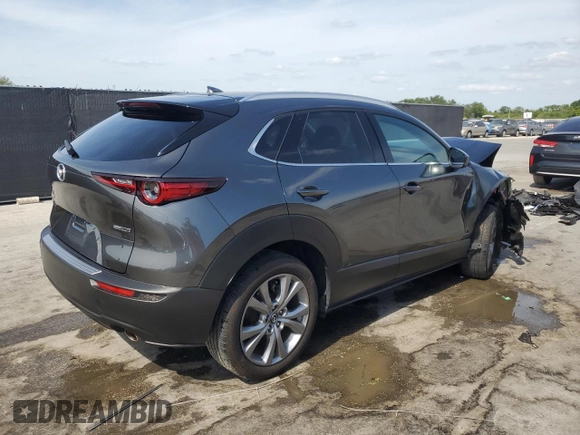 2023 Mazda CX-30 S Premium z VIN 3MVDMBDM9PM558451, wystawiony jako Copart lot #53997465 z przebiegiem 27 633 mil mil oraz Nie do naprawy • Non repairable. Historia ofert i sprzedaży dostępna na DreamBid. Obrazek 3.