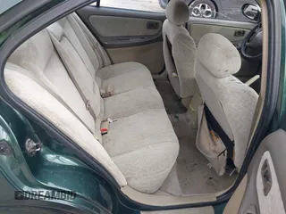 2001 Nissan Altima GXE with VIN 1N4DL01D81C149403, listed as a IAAI auction lot 41619291 with 317,984 mi miles. Bid and sale history available at carsss.com. Image 8.
