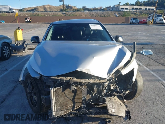 2015 Infiniti Q50 z VIN JN1BV7AP4FM341453, wystawiony jako IAAI lot #41755534 z przebiegiem Nie podano mil oraz . Historia ofert i sprzedaży dostępna na DreamBid. Obrazek 12.