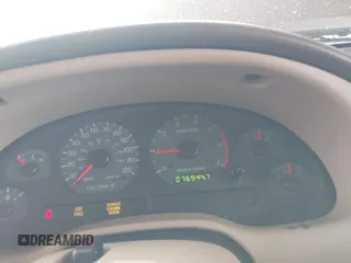 2002 Ford Mustang Standard z VIN 1FAFP40482F157569, wystawiony jako IAAI lot #42372535 z przebiegiem 76 944 mil mil oraz . Historia ofert i sprzedaży dostępna na DreamBid. Obrazek 7.
