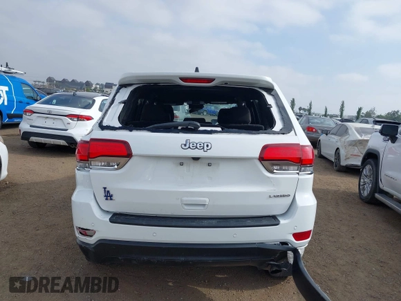 2020 Jeep Grand Cherokee Laredo E with VIN 1C4RJEAG4LC245884, listed as a IAAI auction lot 42564754 with 63,356 mi miles and . Bid and sale history available at DreamBid. Image 17.