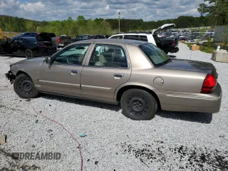2005 Mercury Grand Marquis GS z VIN 2MEFM74W05X673934, wystawiony jako Copart lot #52608785 z przebiegiem 170 558 mil mil oraz Szkody całkowita. Historia ofert i sprzedaży dostępna na DreamBid. Obrazek 2.