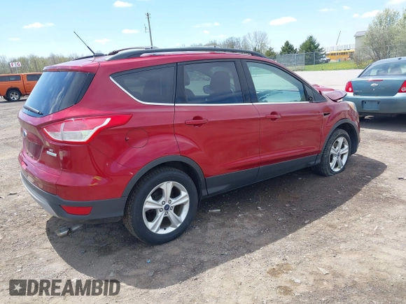 2014 Ford Escape SE with VIN 1FMCU0GX5EUB58169, listed as a IAAI auction lot 42155452 with 89,002 mi miles and . Bid and sale history available at DreamBid. Image 4.