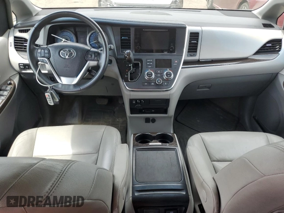 2017 Toyota Sienna XLE with VIN 5TDDZ3DC0HS150633, listed as a Copart auction lot 62642575 with 94,439 mi miles and Salvage title. Bid and sale history available at DreamBid. Image 8.