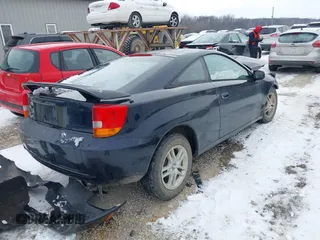 2001 Toyota Celica GT with VIN JTDDR32T310073199, listed as a IAAI auction lot 41262183 with 174,004 mi miles. Bid and sale history available at carsss.com. Image 4.